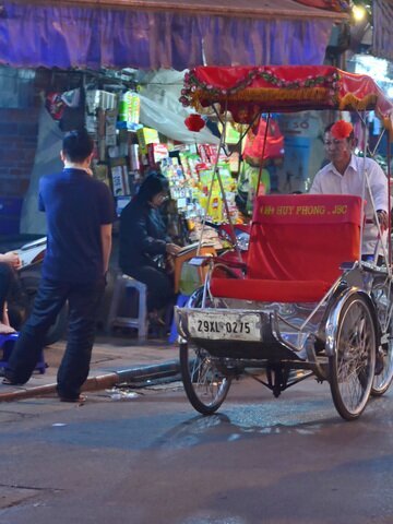 Hop on a cyclo and pass through the famed Old Quarter.
