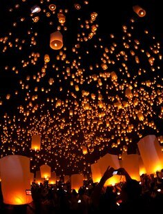 Thousands of lanterns lighting up the sky at Yi Peng Lantern Festival.