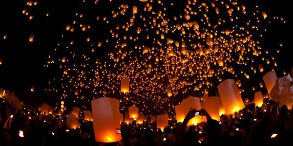 Thousands of lanterns lighting up the sky at Yi Peng Lantern Festival.
