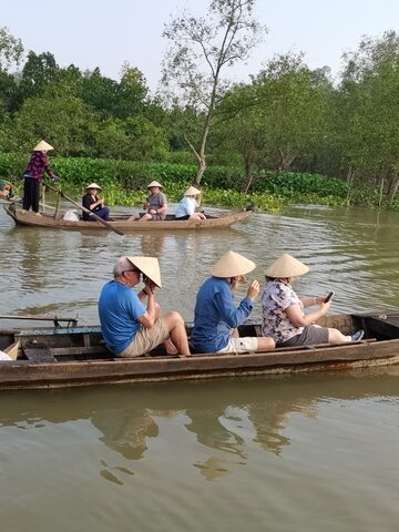 ake a sampan ride through the picturesque canals of the Mekong Delta.