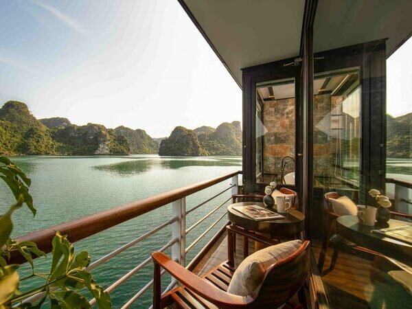 Unwind and reconnect with nature on your private balcony by Orchid Cruise
