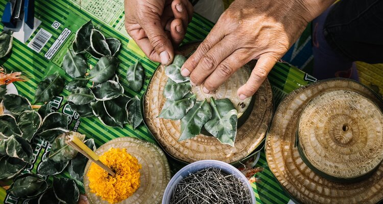 Making a krathong during loy krathong festival