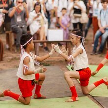 A traditional Muay Thai performance by children.
