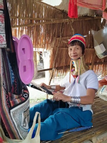 Visit a long-neck Karen minority village.
