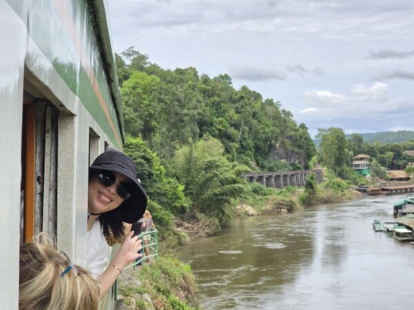 Ride the historic Death Railway across its original wooden viaduct.