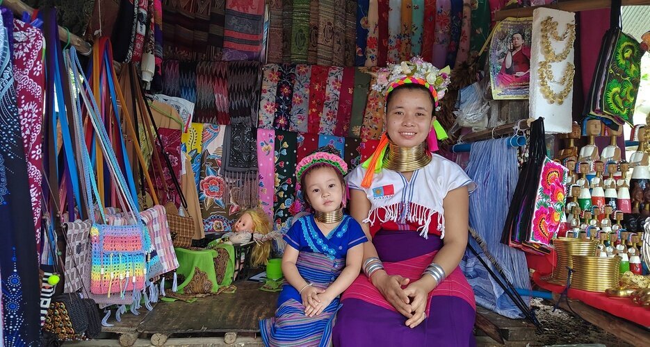 Karen mother and daughter posing for photos