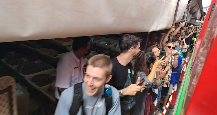 Take a Train into Maeklong Railway Market