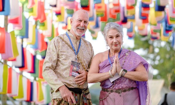 Dressed in traditional Thai attire