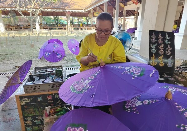 Paint a traditional Bo Sang umbrella with local artisans
