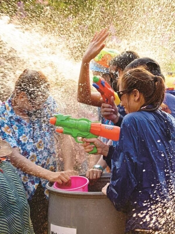 Dive Into the Vibrant Songkran Splashdown With Locals