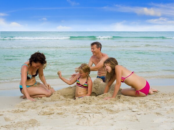 Relaxing on the beach with kids