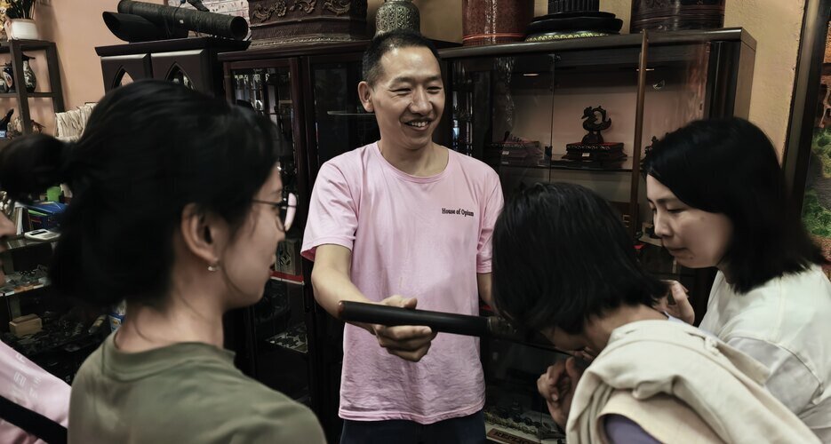 The owner's son shared us the story behind the opium pipe.