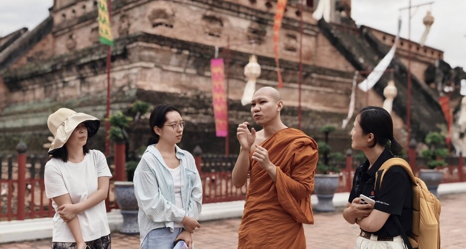 A monk in Wat Chedi Luang shows us around the temple.