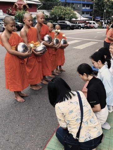 Listen to the daily monk chanting for peace at Wat Suan Dok.
